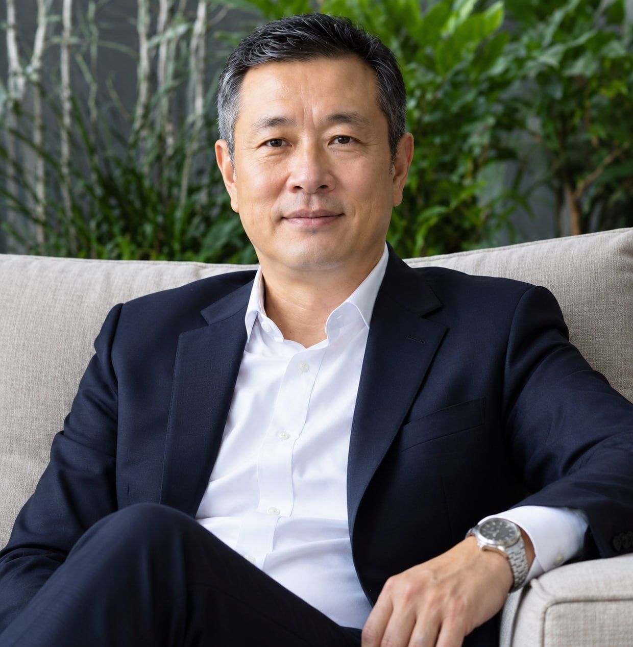Lin Haifeng seated in a lounge